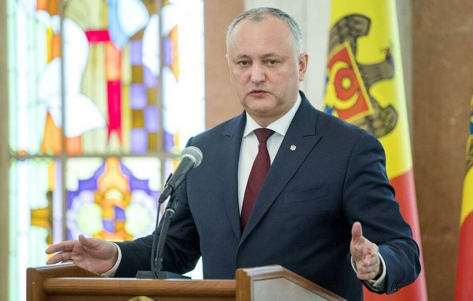 The President of Moldova Igor Dodon gestures during a briefing